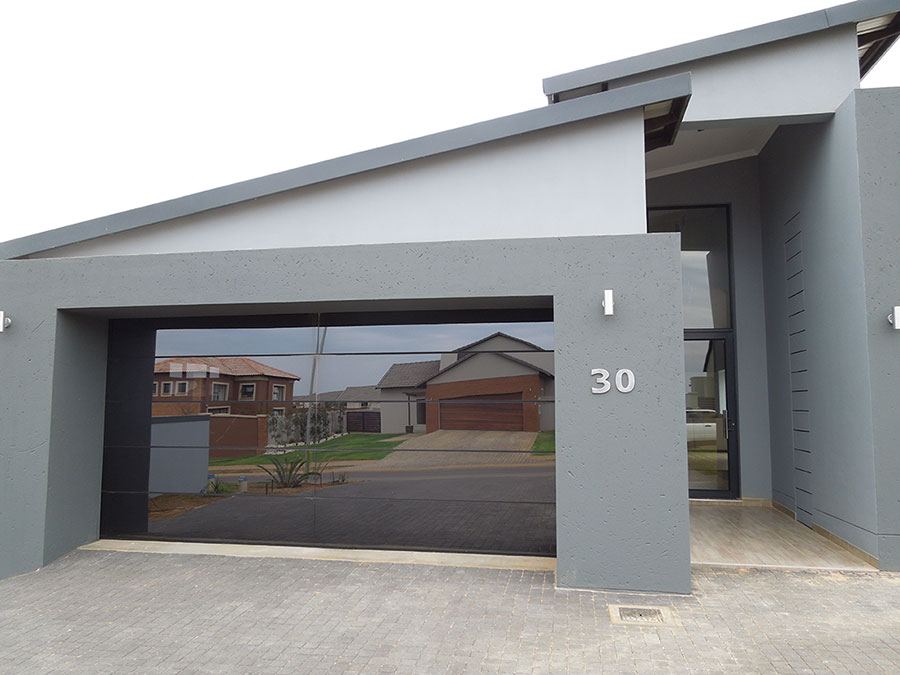 Frameless Tinted Glass Garage Door - 10 X 8 ft - nickkys garage doors